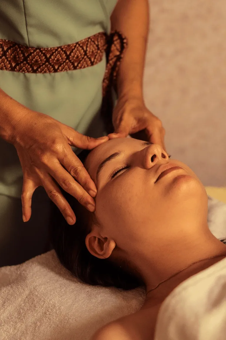 Relaxing head and neck massage at ApaThai Almaty performed by a professional Thai therapist.